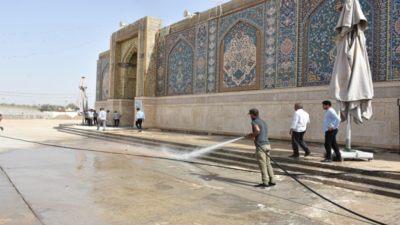 أعمال غسل وتنظيف الساحات والفضاءات الخارجية والاشجار
