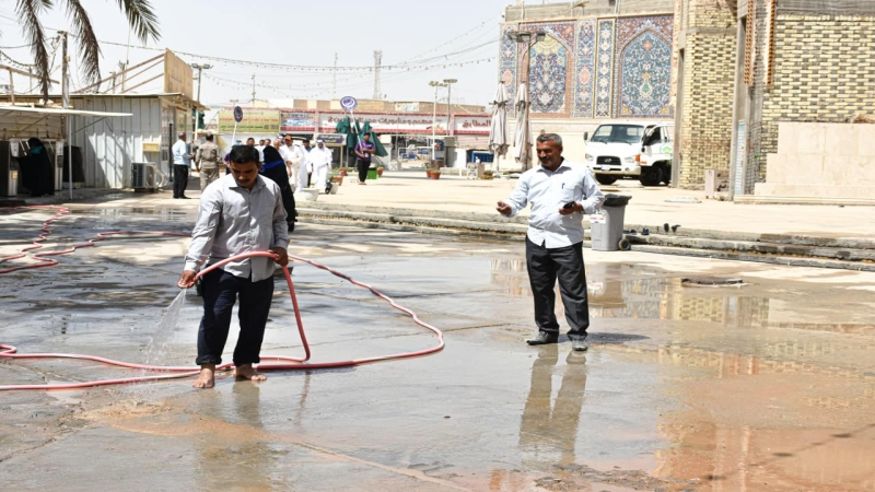 أعمال غسل وتنظيف الساحات والفضاءات الخارجية والاشجار